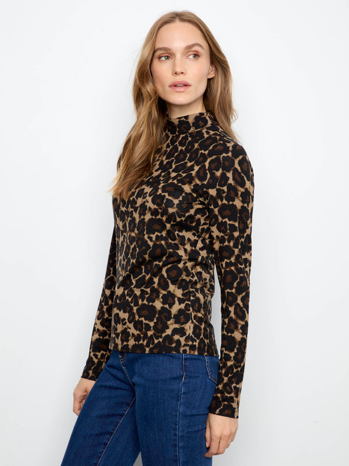 Elevate your wardrobe with this sleek mock neckline top in bold leopard print, offering both style and comfort. By Charlie B.