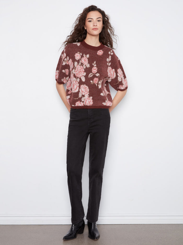 Elegant floral sweater with a mock neck and relaxed fit, perfect for stylish comfort by Charlie B.