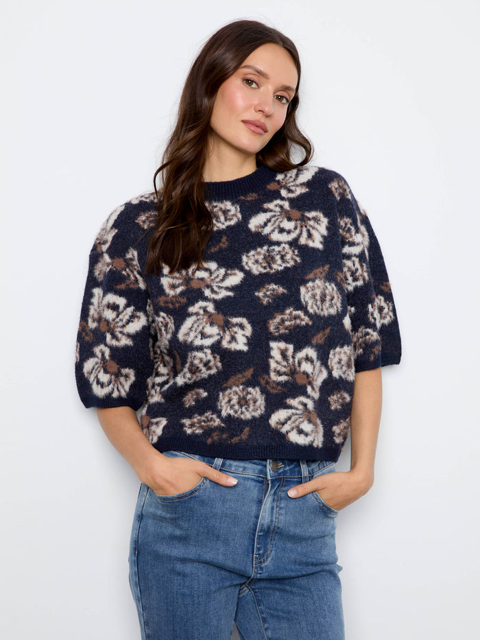 Floral patterned top with a mock neck, offering a chic and modern touch for any casual outing by Charlie B.