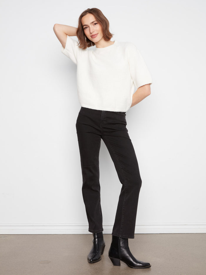Chic top featuring balloon elbow sleeves for added style by Charlie B.