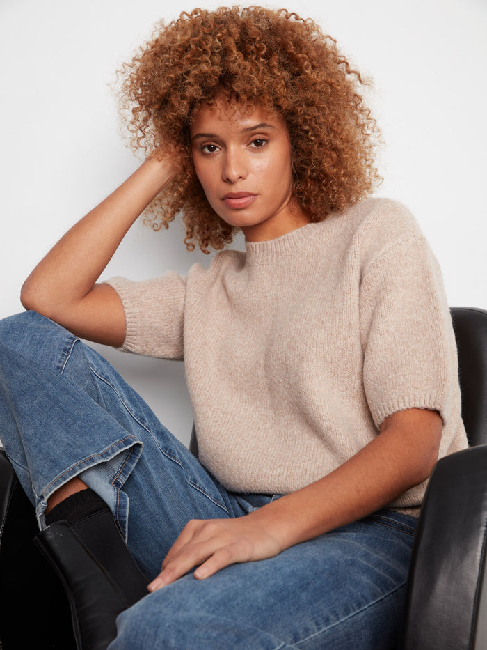 Enjoy the relaxed fit of this sweater, providing both style and ease of movement. By Charlie B.