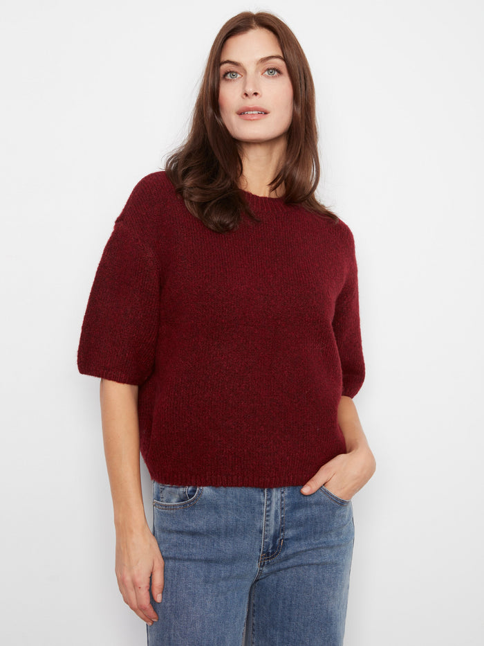 Balloon elbow sleeves enhance the chic appeal of this versatile wardrobe staple. By Charlie B.