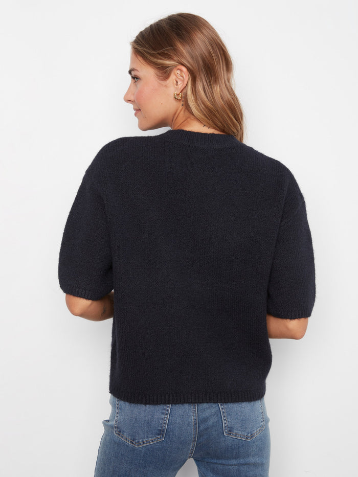 Enjoy the relaxed fit of this sweater, providing both comfort and style for everyday wear. Versatile fashion piece by Charlie B.