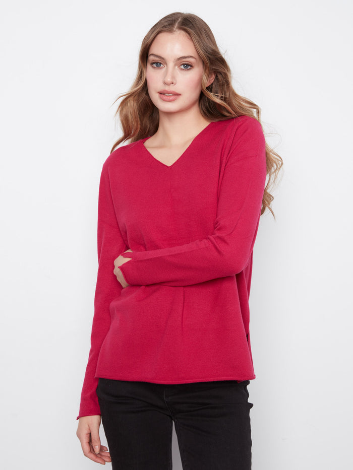 Crafted from soft knit fabric, offering both warmth and style effortlessly. By Charlie B.