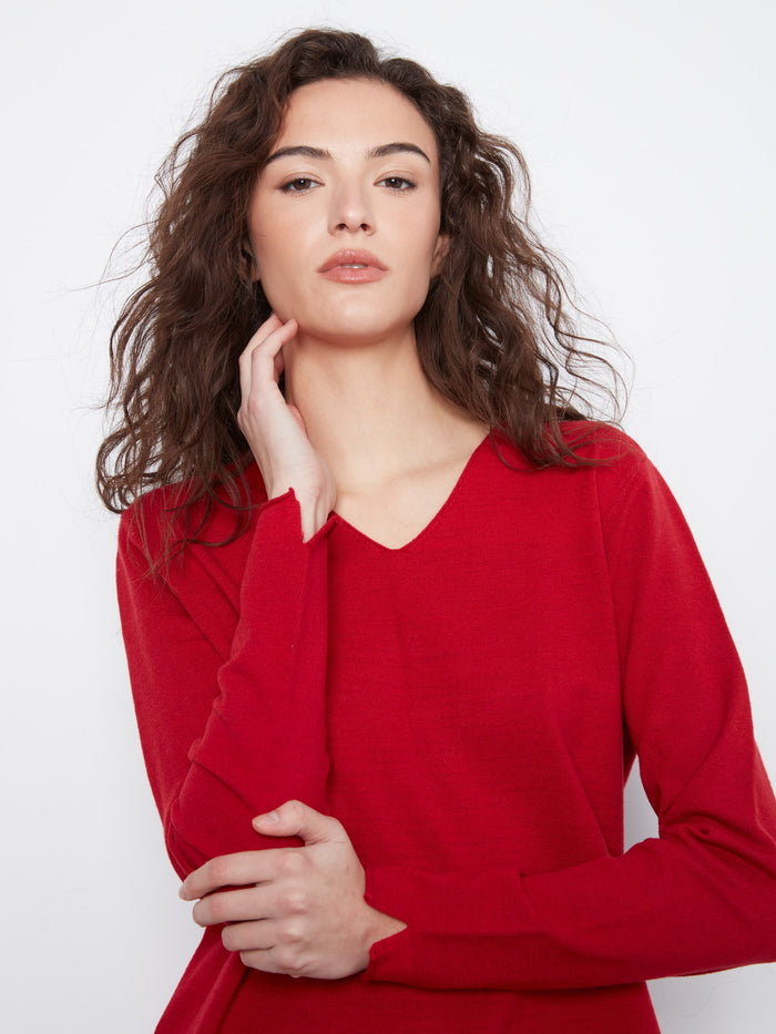 This red top features a relaxed fit, offering both style and ease for any occasion. By Charlie B.