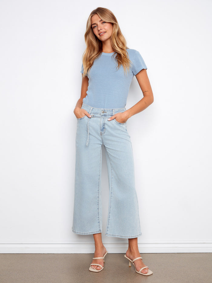 These jeans feature a wide leg design, offering a stylish and comfortable fit by Charlie B.