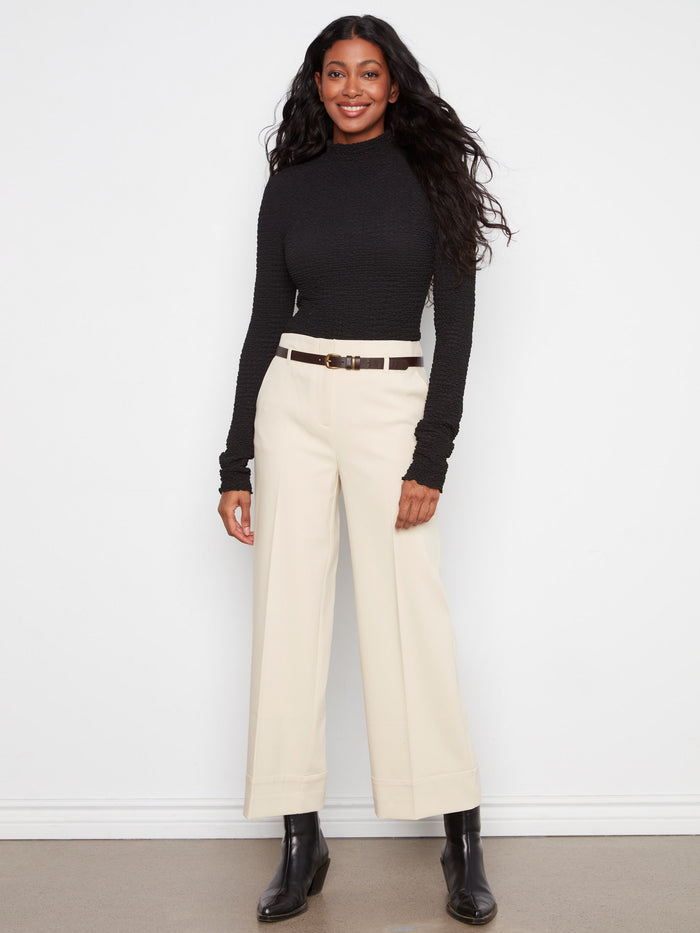 With a sleek belted design, these pants provide an elegant silhouette for versatile styling. By Charlie B.