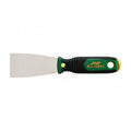 green and black handle on a stainless steel putty knife