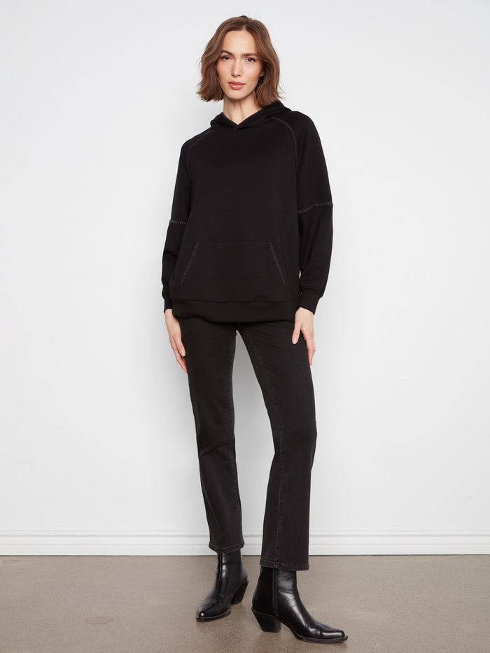 Intricate blanket stitch details enhance the overall look of this hoodie, adding unique texture and style by Charlie B.