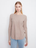 Sweater with a stylish boat neck, offering a chic and modern look. Perfect for any casual outing. By Charlie B.