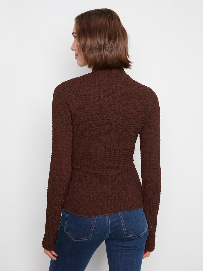 Mock neck style provides a sophisticated look in this textured top by Charlie B.