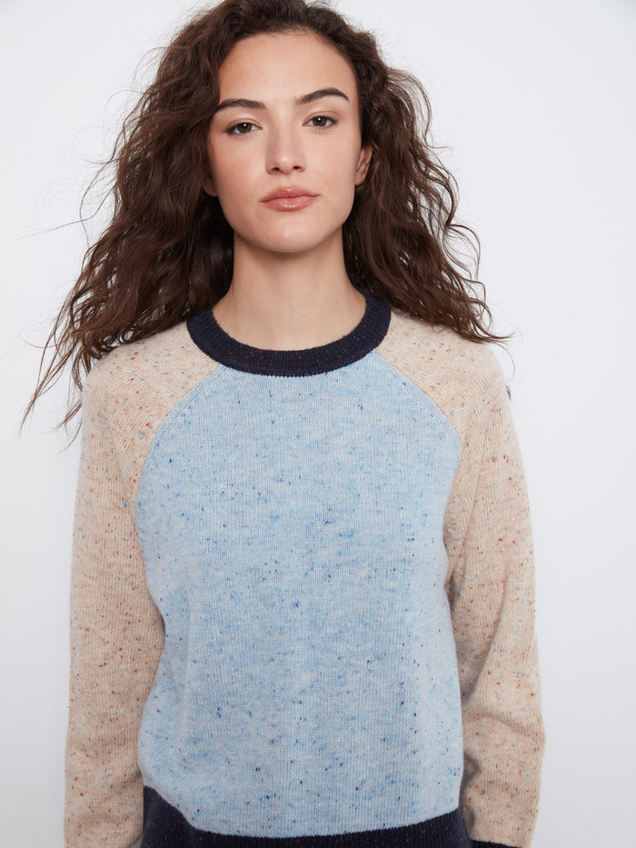 Designed with long raglan sleeves, this sweater offers both comfort and style for everyday wear. By Charlie B.
