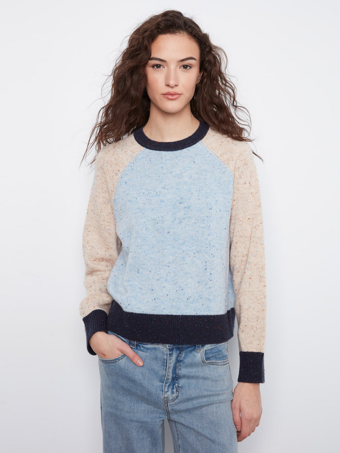 The speckled knit fabric provides a unique texture, making this sweater stand out in any wardrobe. By Charlie B.