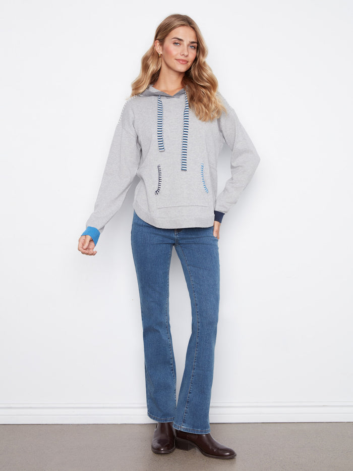 Designed with contrast details on the cuffs, this gray hoodie adds an eye-catching element to your wardrobe essentials by Charlie B.