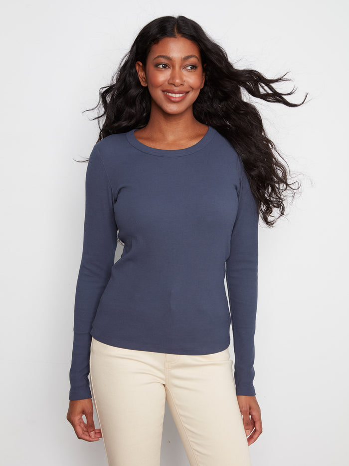 Crew neck long sleeve top in midnight blue with a soft ribbed finish and slim silhouette by Charlie B.