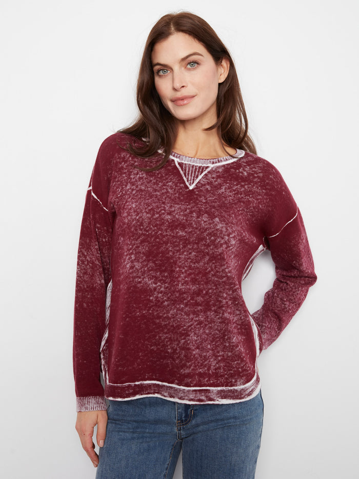 Featuring a rounded hem, this sweater adds a touch of modern elegance to any outfit. Enjoy the soft feel of cotton by Charlie B.