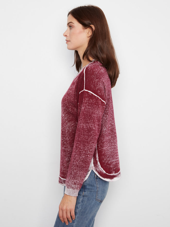 With its classic crew neckline, this sweater is both timeless and stylish. Experience the quality of 100% cotton by Charlie B.