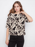 Chic top with a mock neck, featuring a stylish animal print pattern and soft brushed knit fabric for ultimate comfort by Charlie B.
