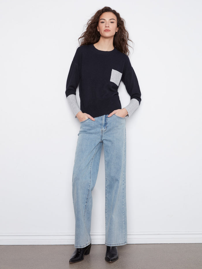 Crew neck navy sweater with unique contrast elements, perfect for casual outings by Charlie B.