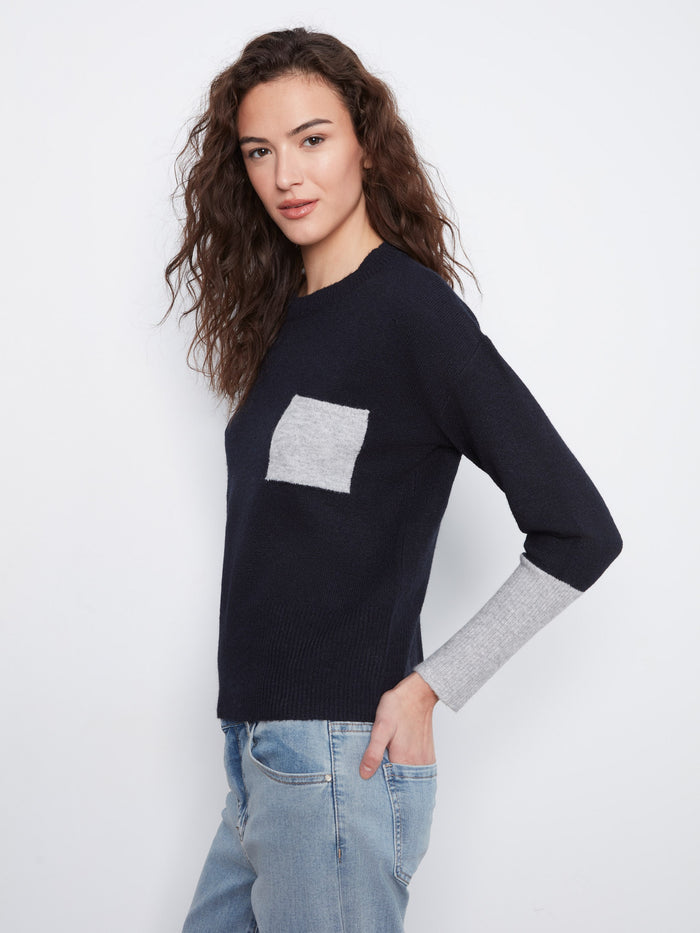 Sweater in heather grey with a relaxed fit and eye-catching red accents by Charlie B.