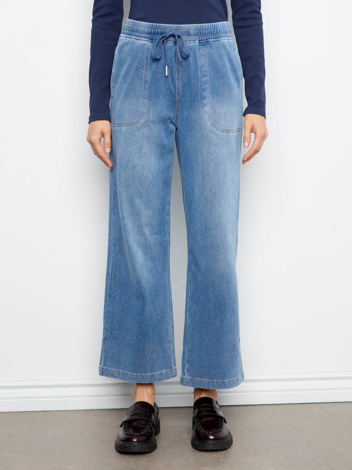 Soft knit denim cropped pants with an elastic waistband and drawstring, perfect for casual comfort by Charlie B.