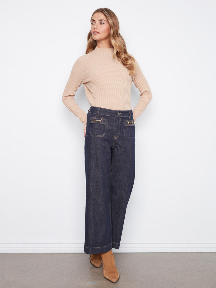 Trendy cropped length denim with unique horsebit detail on the patch pockets for added flair by Charlie B.