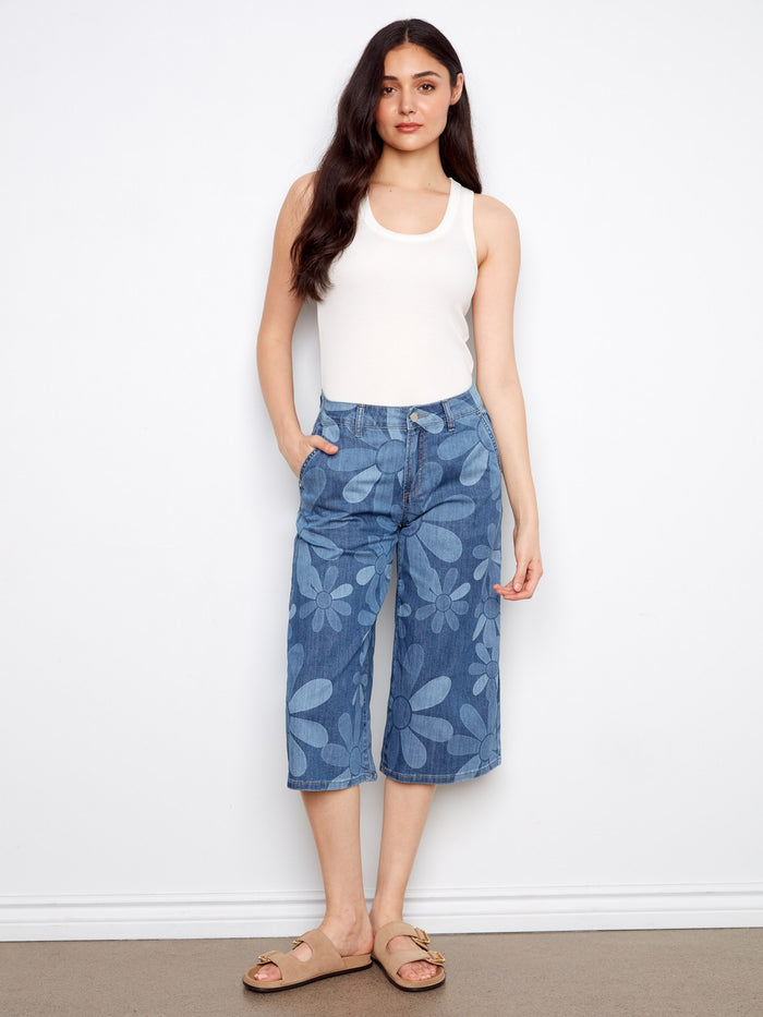 Floral print denim palazzo jeans with a cropped length and regular rise, crafted for comfort by Charlie B.
