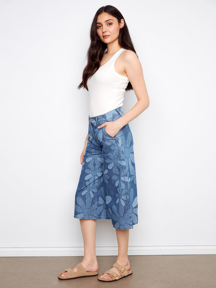 Regular rise cropped jeans with a wide leg and vibrant floral design, perfect for casual outings by Charlie B.