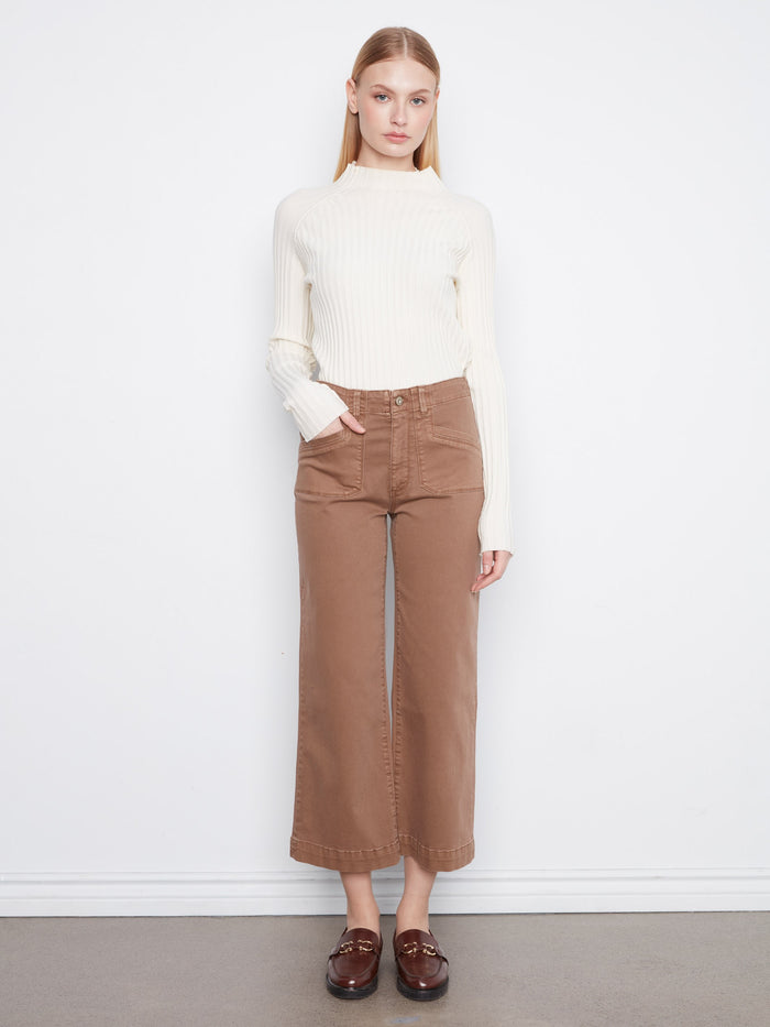 These pants feature a wide leg design, offering a relaxed silhouette perfect for any casual outing. By Charlie B.