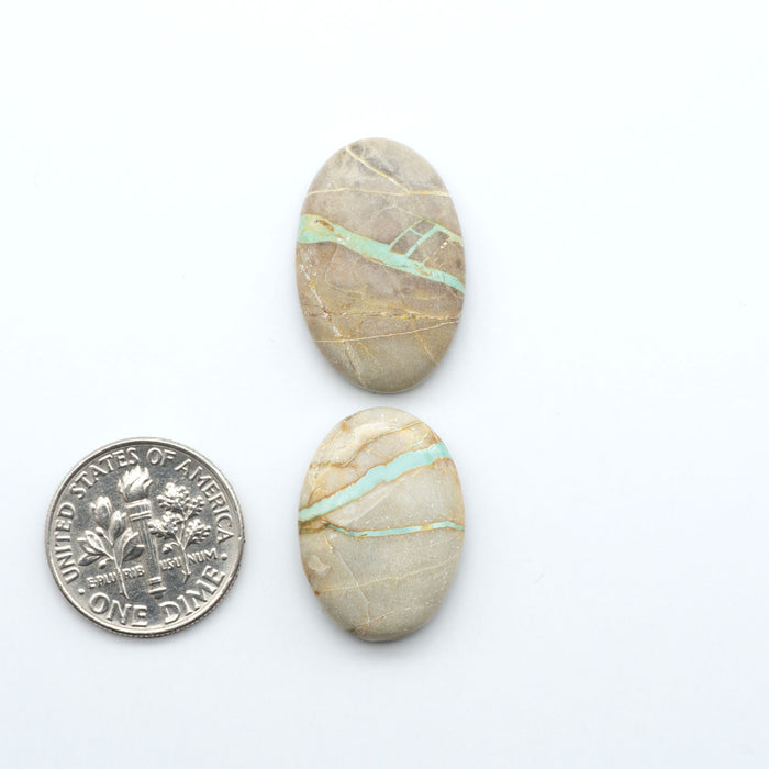 These Crow Springs Ribbon Turquoise Cabochons have a rich color and matrix that are sure to add a unique touch to a variety of jewelry pieces.