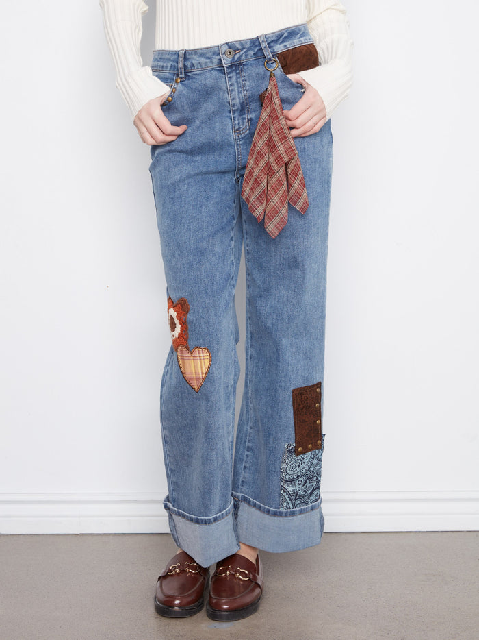 Adorned with eye-catching decorative patches, these jeans are designed to stand out while maintaining comfort by Charlie B.