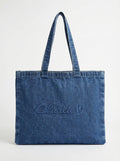 Stylish denim bag with carry handles and embossed Charlie B logo, perfect for daily use. By Charlie B.