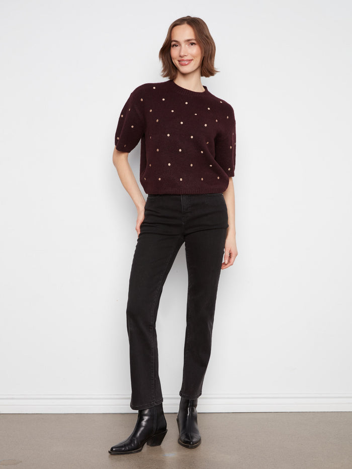Mock neck design enhances the classic appeal of this heather-wine sweater with stylish polka dot details. By Charlie B.
