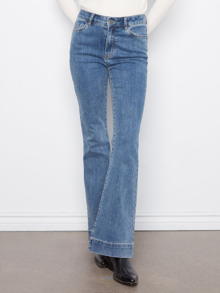 Button-zip closure adds classic detail to these versatile long length jeans. Designed by Charlie B.