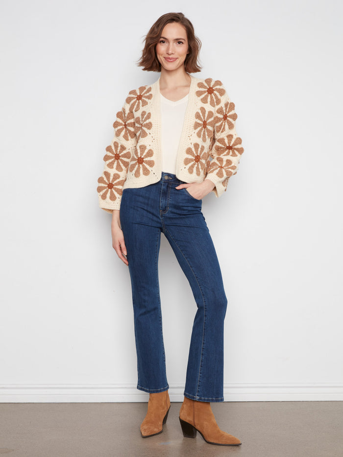 Cropped ecru crochet cardigan adorned with large floral designs and an open-front style by Charlie B.