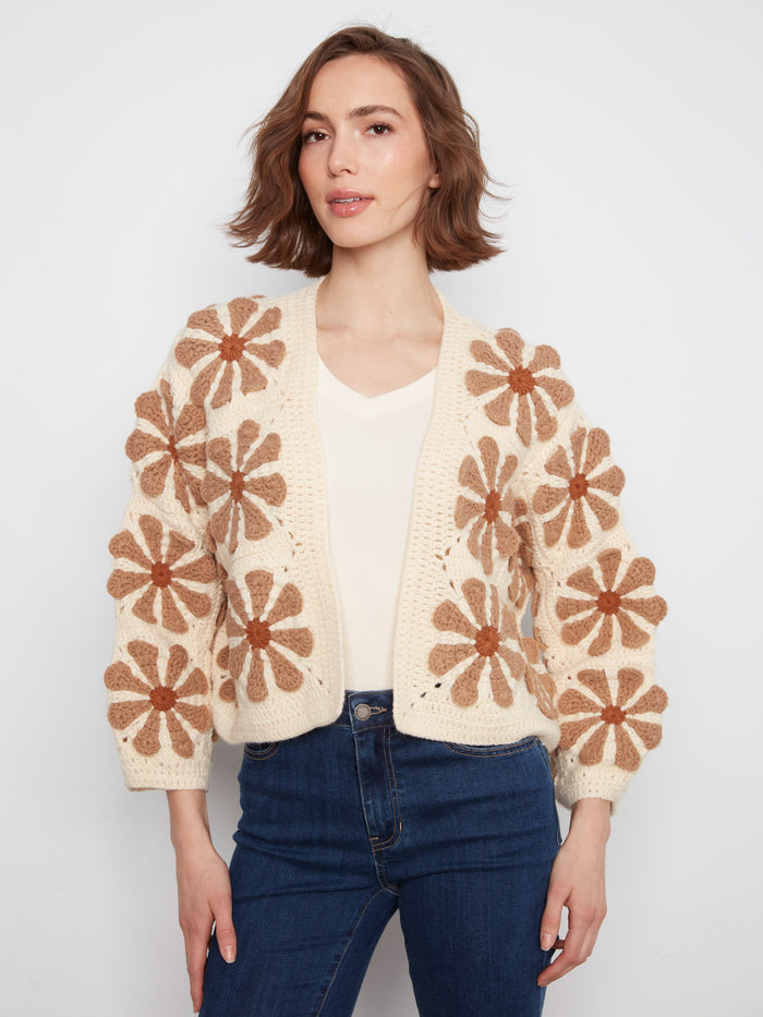 Elegant ecru crochet cardigan with unique handcrafted flower details and a comfortable relaxed fit by Charlie B.