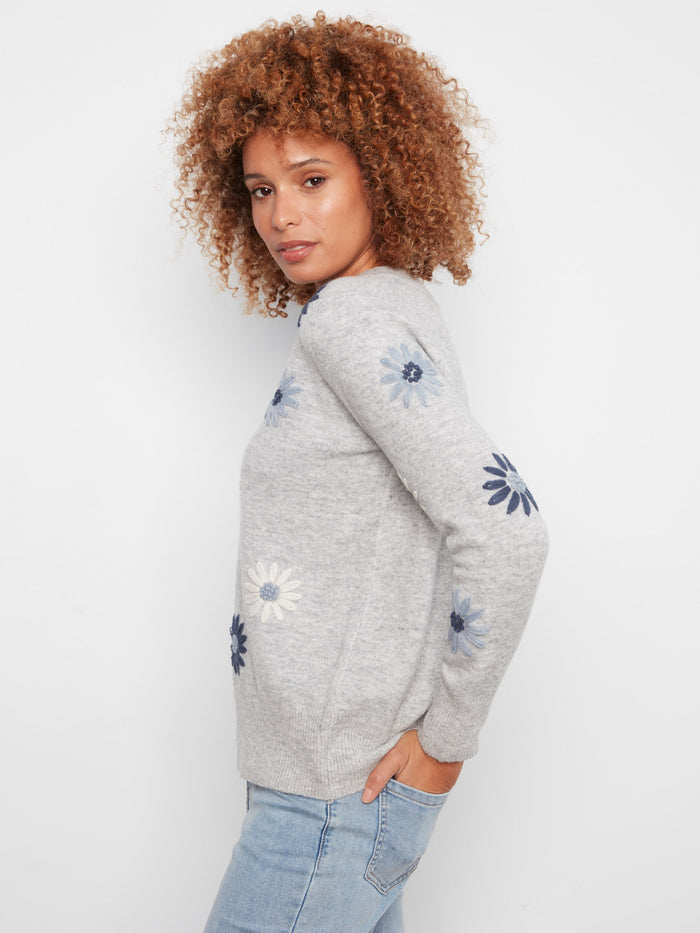 Heather-grey top showcasing lovely floral patterns and a comfortable V-neck design by Charlie B.