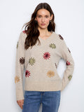 Sweater with a V-neck design, featuring elegant floral embroidery for a touch of charm. Crafted by Charlie B.