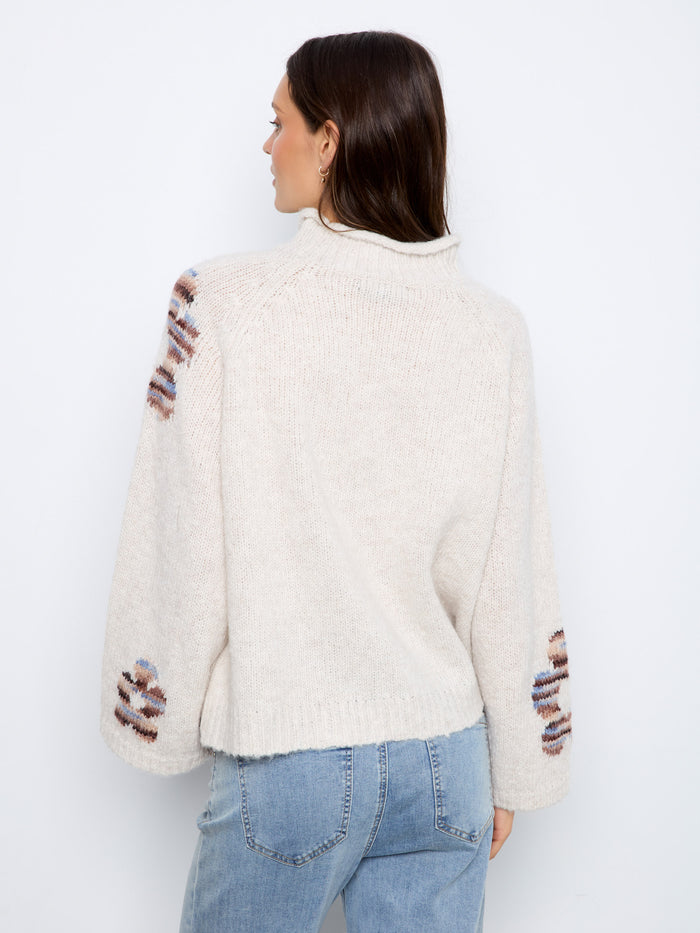 Designed for a comfortable and relaxed fit, this versatile sweater is perfect for layering in cooler weather by Charlie B.