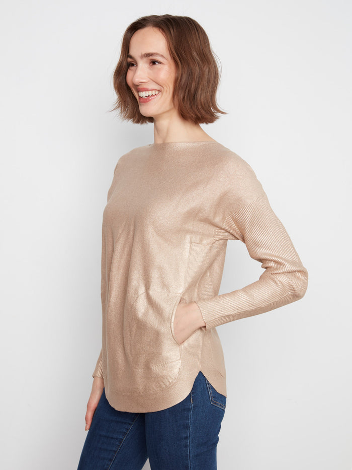 Cozy knitwear with practical front pockets, ideal for keeping essentials close at hand. Rounded hem enhances the look by Charlie B.