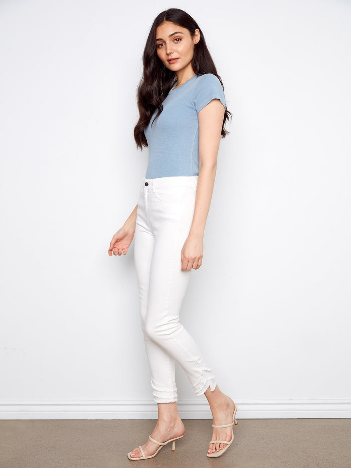 Designed with a five-pocket style, these jeans combine functionality with fashion effortlessly. By Charlie B.
