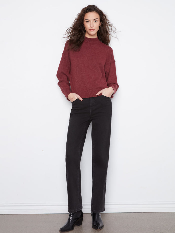 Elegant Merlot sweater with mock neck design and subtle fringes on sleeves, ideal for a sophisticated yet relaxed look by Charlie B.