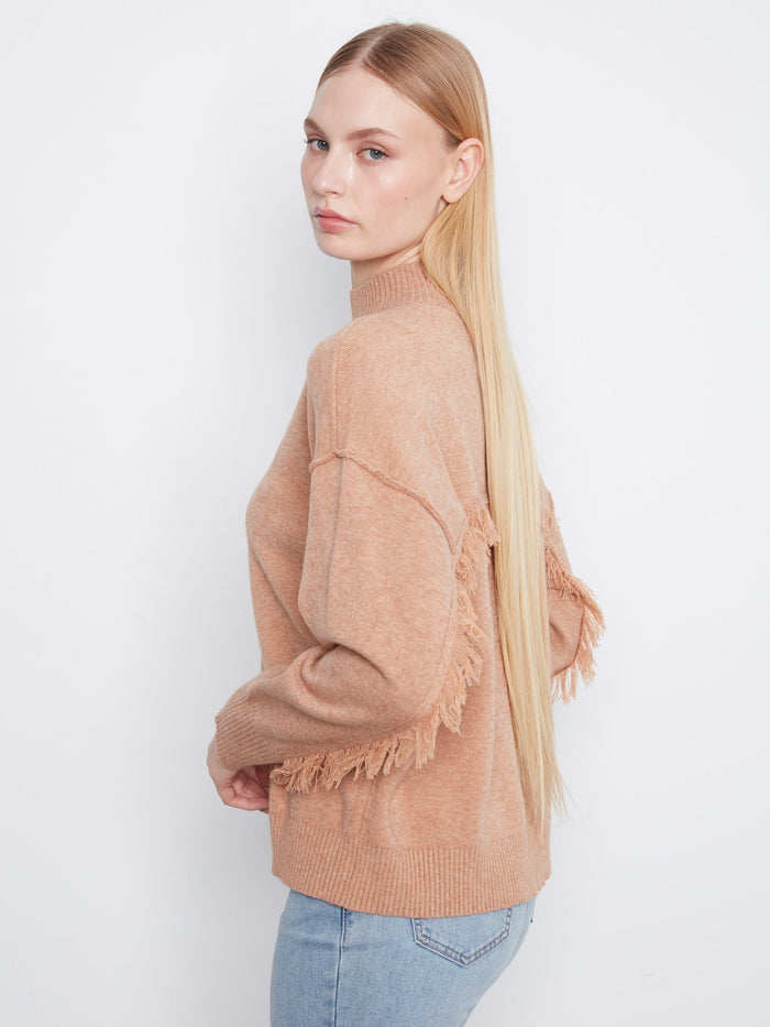 This trendy sweater has drop shoulders for a relaxed and fashionable fit, enhancing comfort and style by Charlie B.