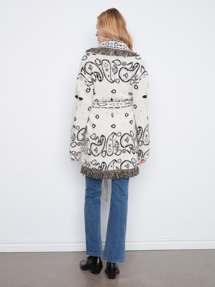 Patch pockets provide practicality and style, making this cardigan both functional and fashionable for everyday wear. By Charlie B.
