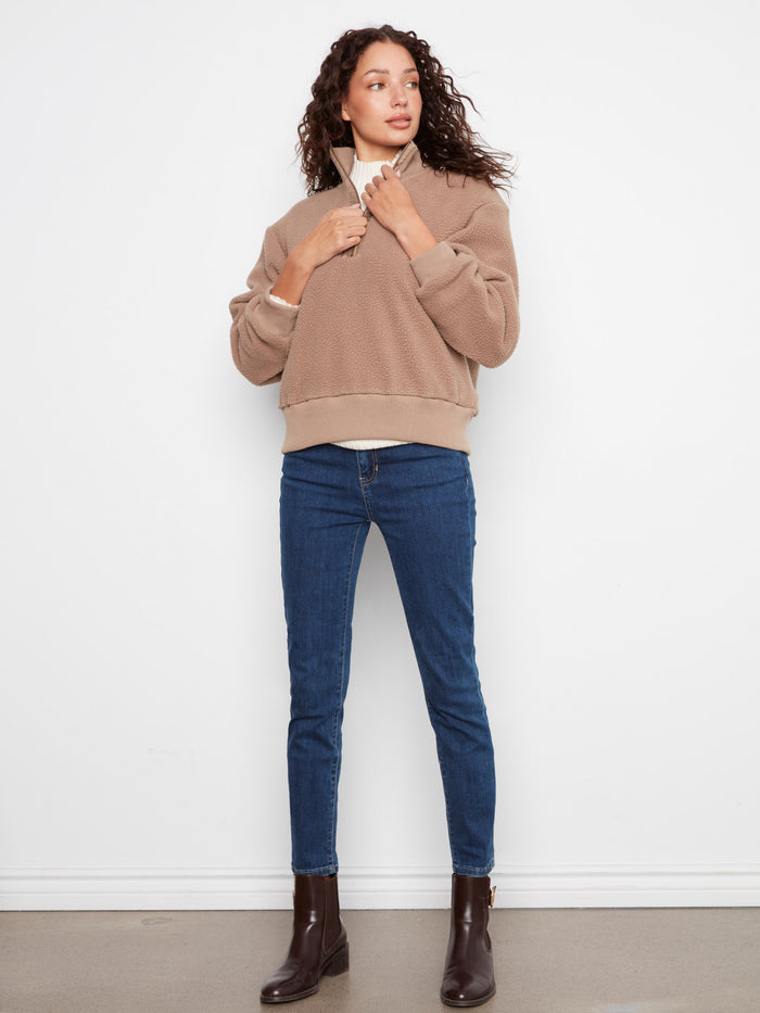 Soft taupe pullover with a half-zip closure and ribbed cuffs, ideal for layering by Charlie B.