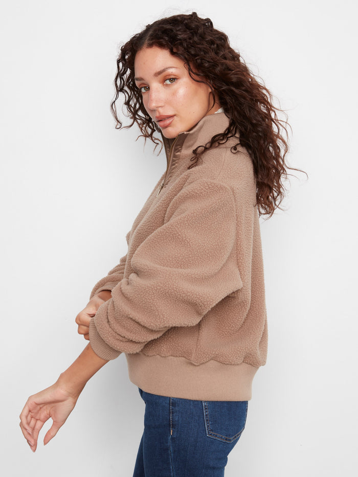Embrace warmth in this soft fleece pullover with ribbed details, perfect for chilly days by Charlie B.