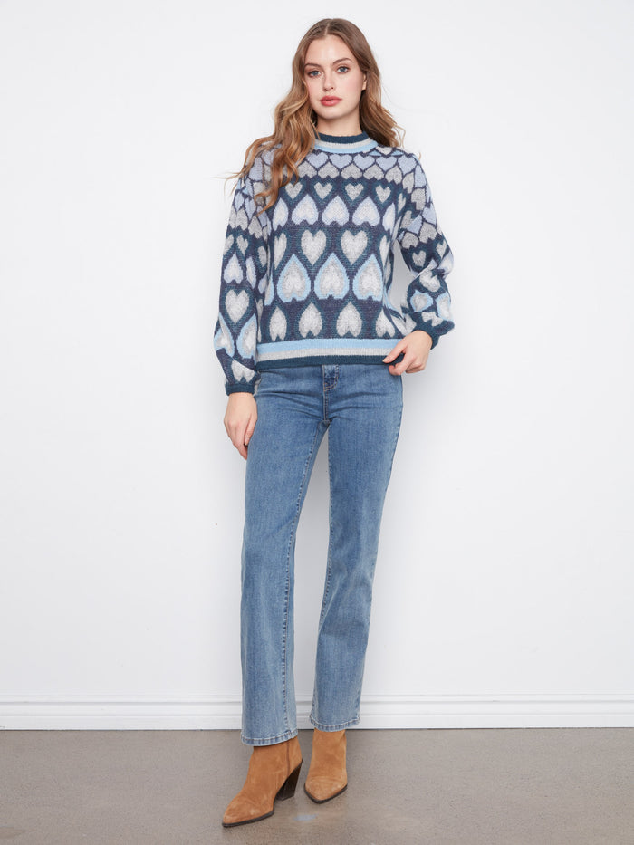 Chic navy sweater with drop shoulder design and lovely heart pattern, ideal for casual outings by Charlie B.