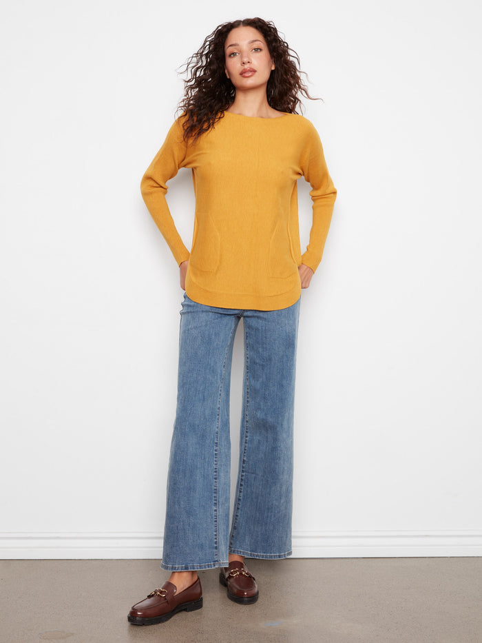 Elegant long sleeves on this cozy sweater make it ideal for cooler days. It's both comfortable and stylish by Charlie B.