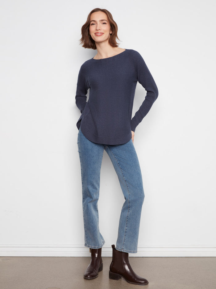 Stylish sweater with rounded hem, offering a chic and comfortable fit for any occasion by Charlie B.
