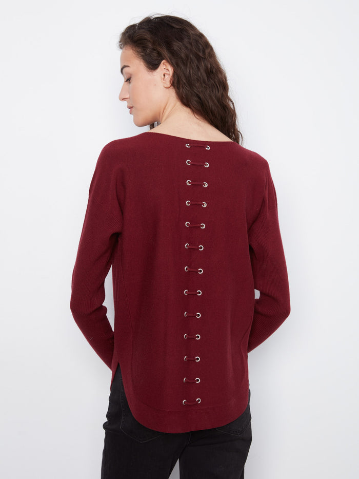 Rich burgundy top featuring intricate back lace-up eyelet details for a chic look by Charlie B.